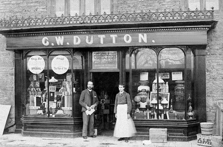 Bill Mathews and George Dutton outside the shop